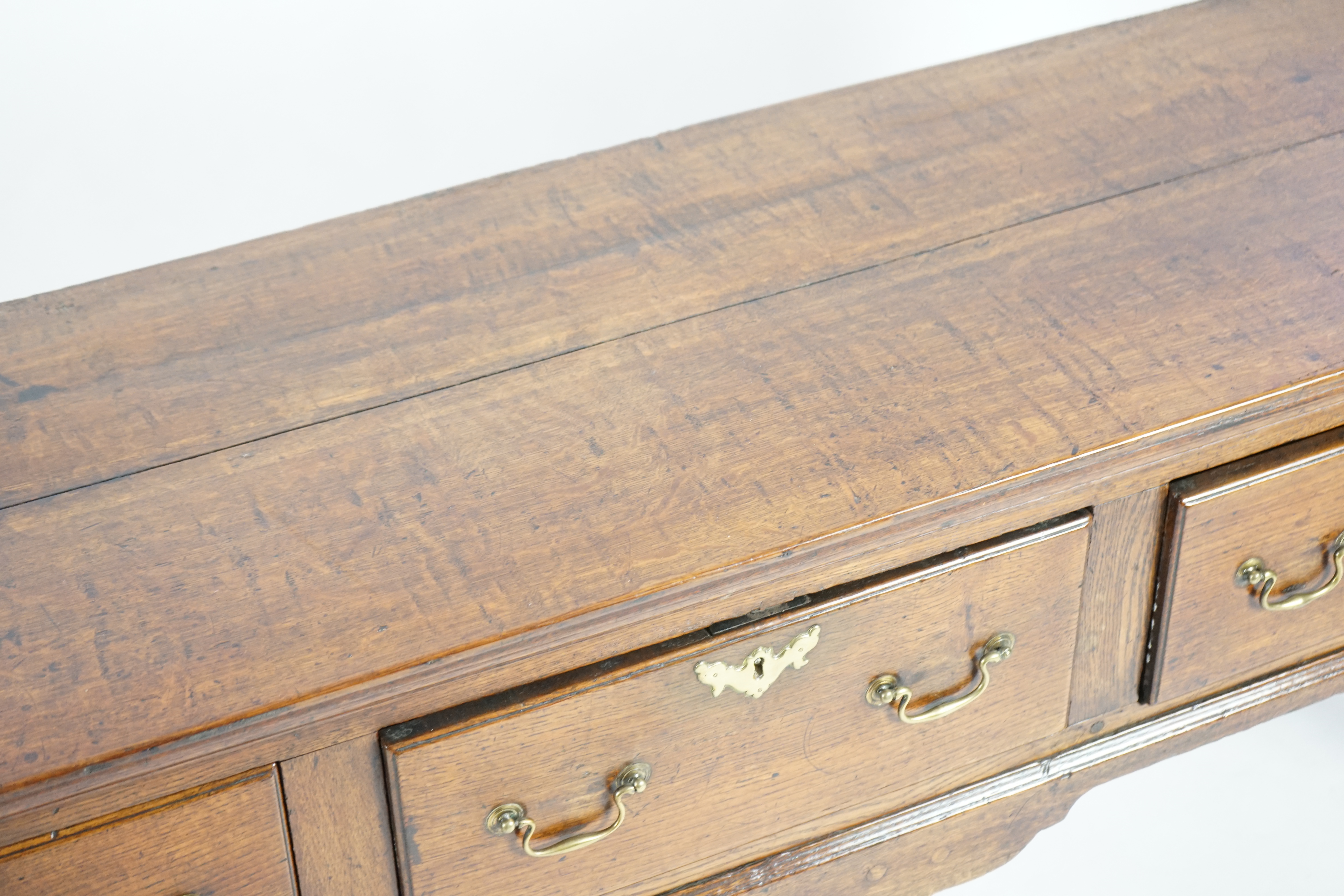 A George III oak dresser base